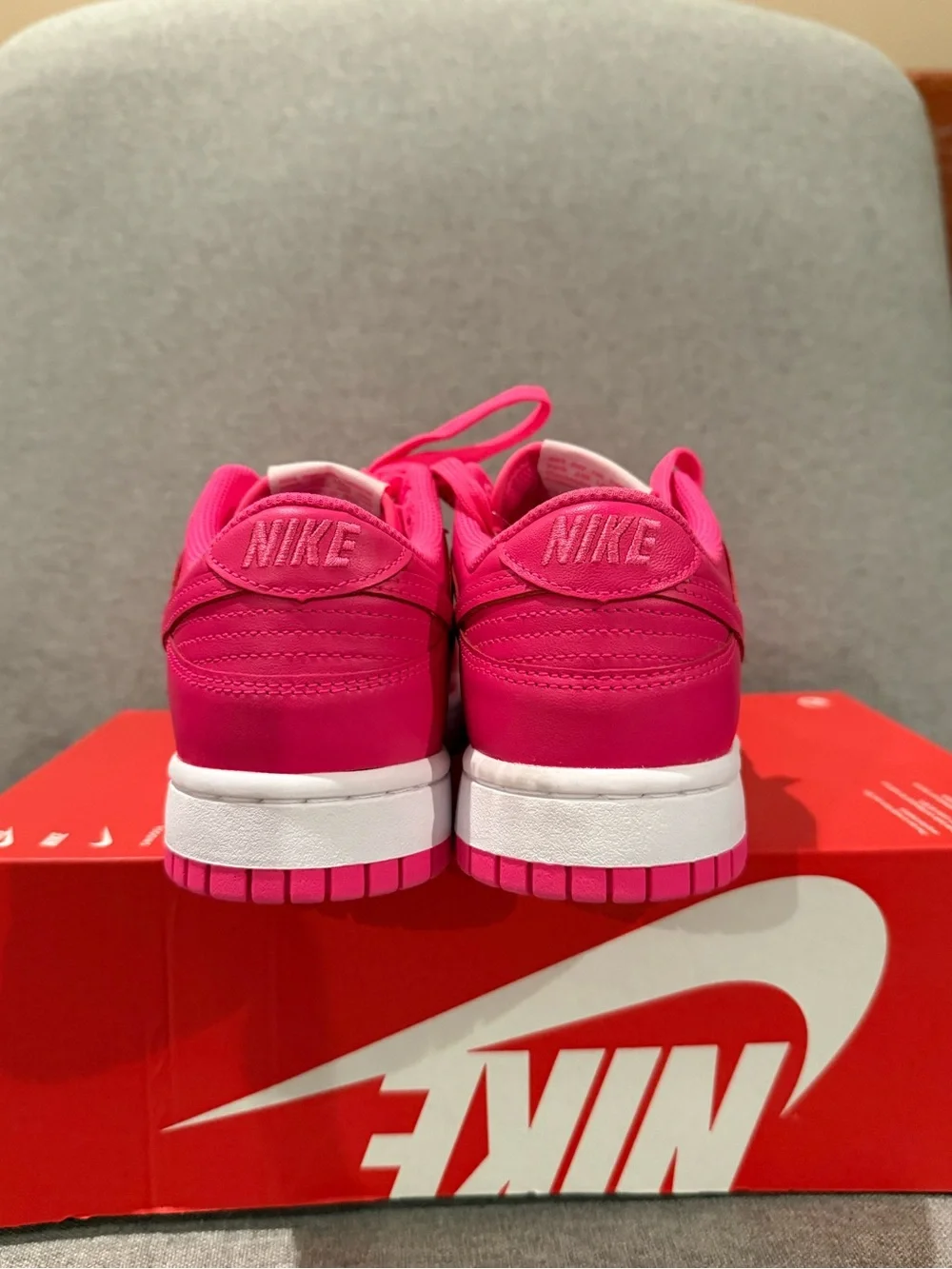 Nike Women's Dunk Low in Vibrant Hyper Pink-white